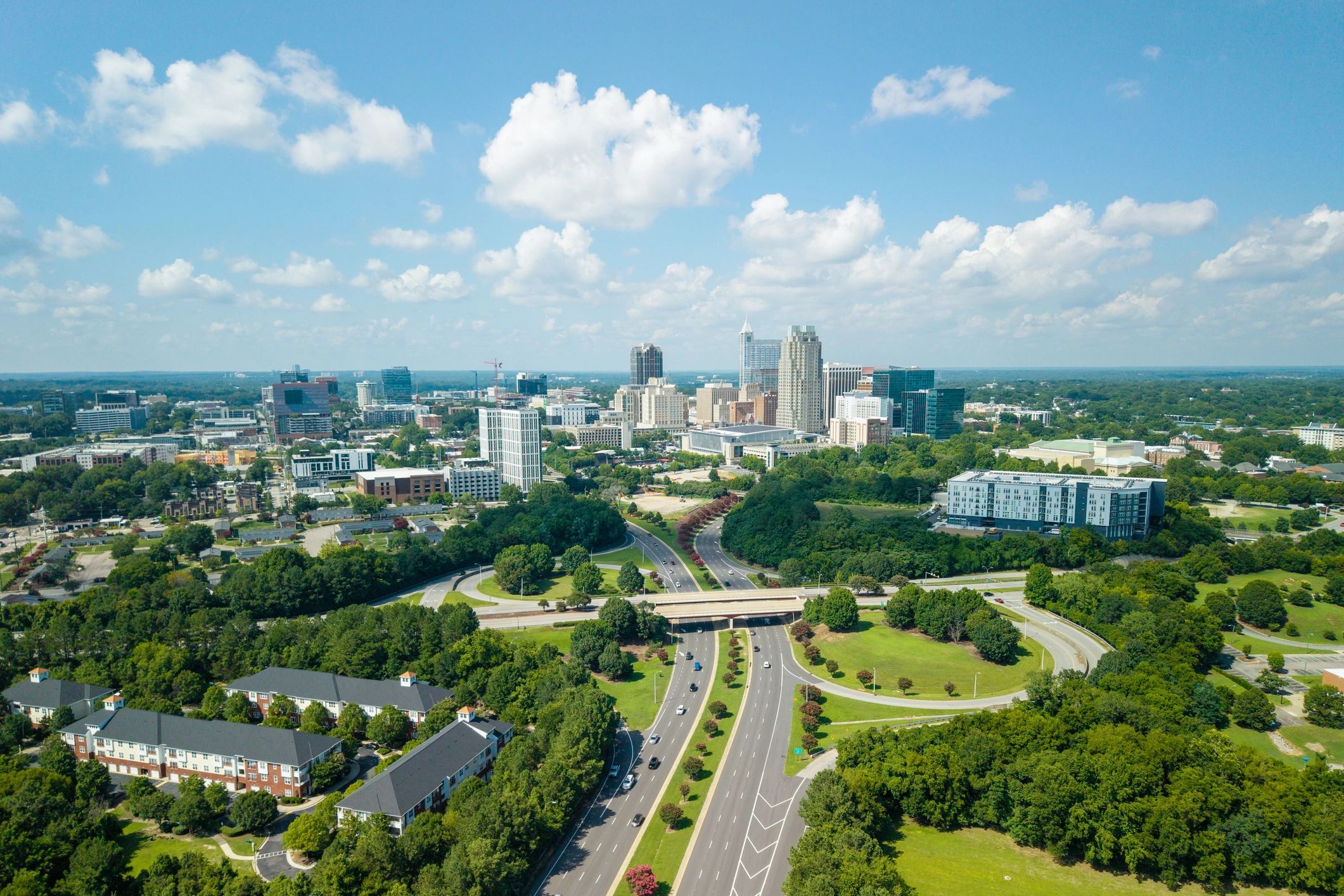 City skyline and roadway representing access to urban destinations